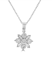 14K gold starburst pendant with round and baguette lab-grown diamonds on a fine chain

