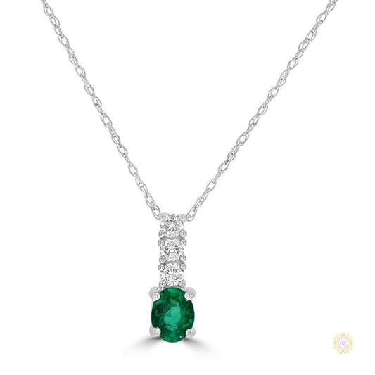 2 ct. Oval Emerald Pendant with Diamond Trio