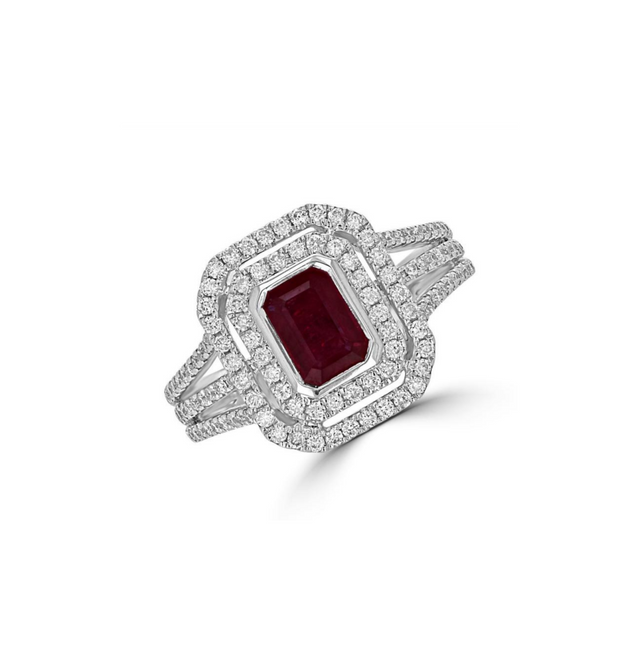 Emerald cut ruby ring with double halo of diamonds set in 14K gold split shank band

