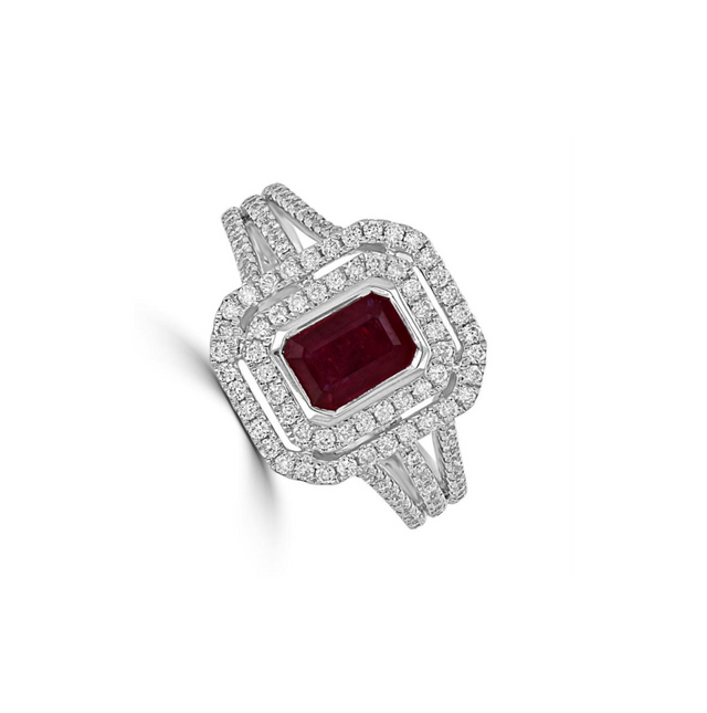 Emerald cut ruby ring with double halo of diamonds set in 14K gold split shank band

