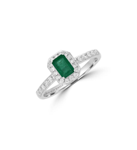 emerald cut emerald halo ring with round diamonds in 14K white gold

