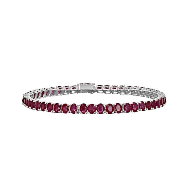 14K white gold tennis bracelet with oval rubies in prong setting
