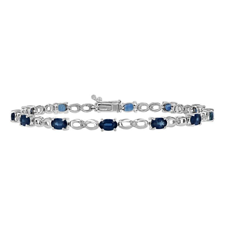 oval sapphire and round diamond tennis bracelet in 14K white gold, perfect for elegant occasions

