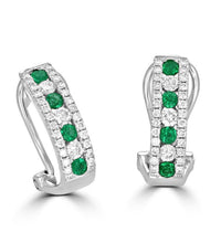 14K white gold omega hoop earrings with round emeralds and diamonds in a double halo prong setting

