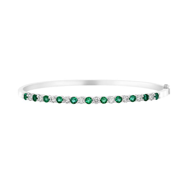 14K white gold bangle bracelet with alternating round emerald and diamond prong settings
