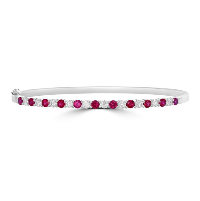 Elegant 14K gold bangle featuring round prong-set rubies and diamonds

