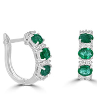 14K white gold hoop earrings featuring oval emeralds and round diamonds in prong setting

