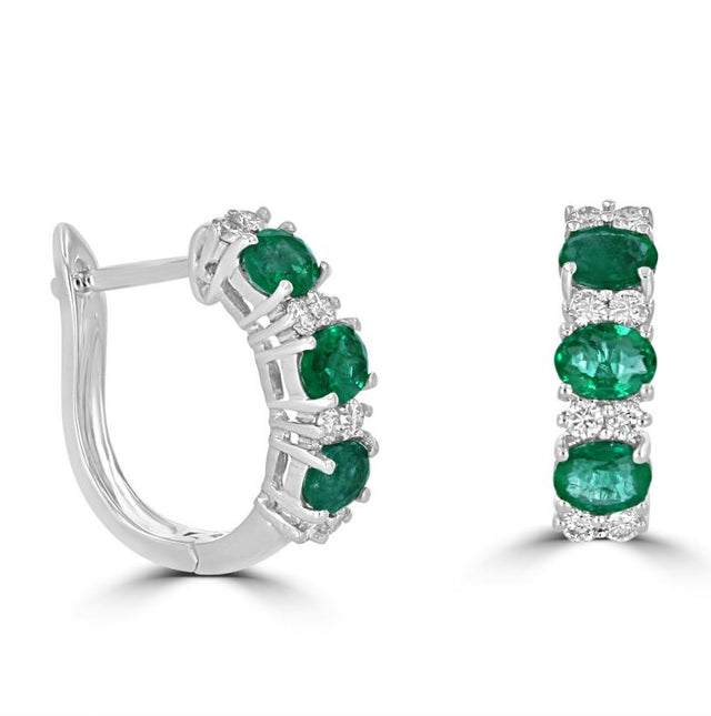 14K white gold hoop earrings featuring oval emeralds and round diamonds in prong setting

