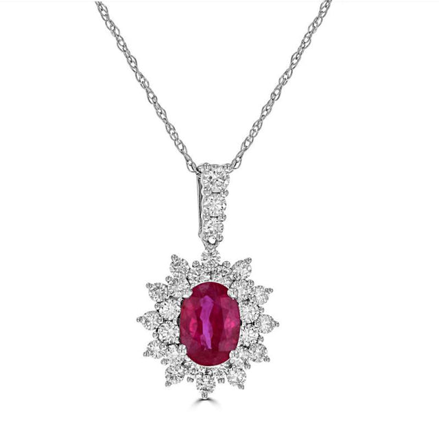 14K white gold pendant featuring a 5x7 oval ruby surrounded by two rows of round brilliant diamonds in a halo setting

