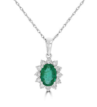 14K white gold oval emerald pendant with diamond halo

