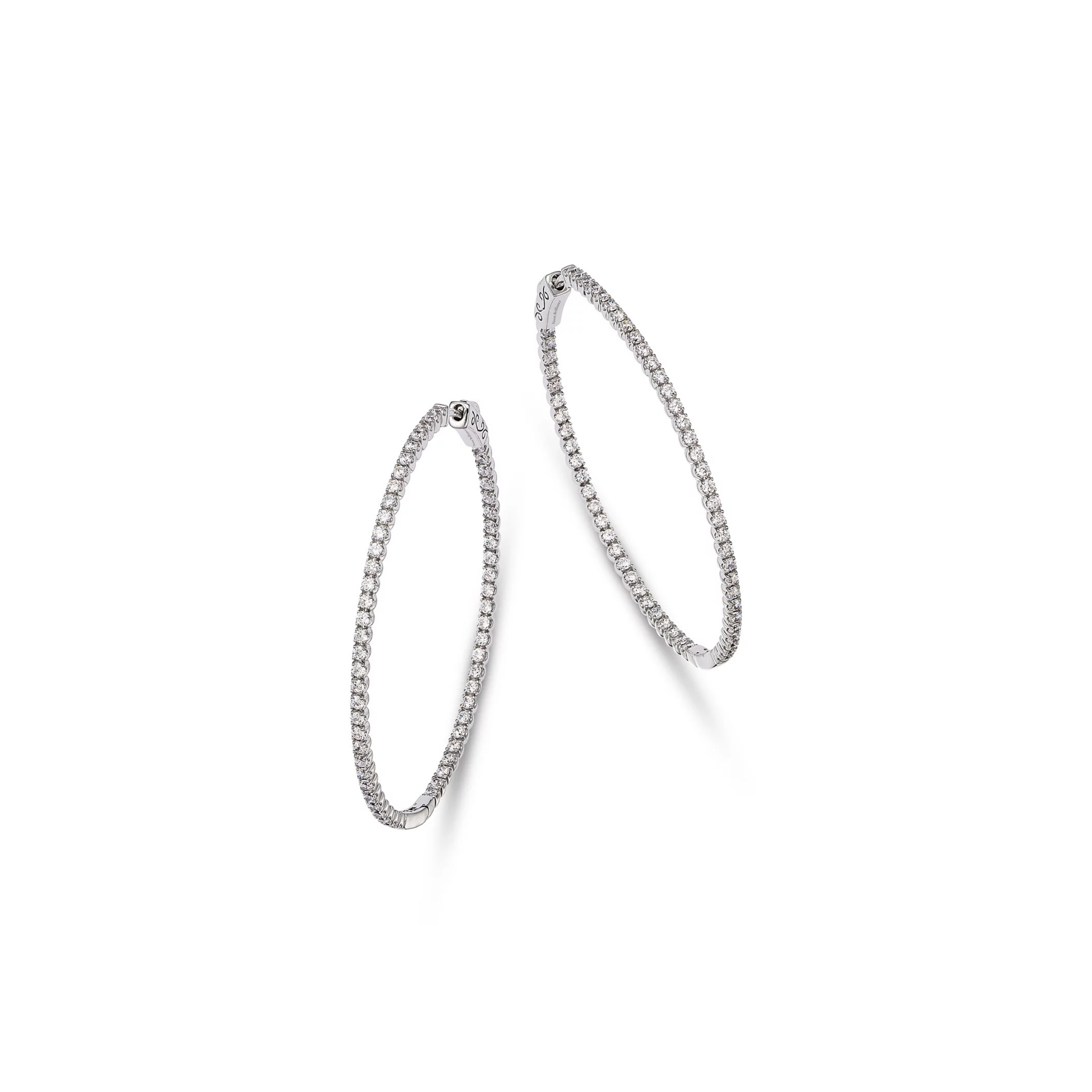Luxury 14K gold diamond hoop earrings featuring pavé-set diamonds in a timeless and elegant design, available in yellow, white, and rose gold.

