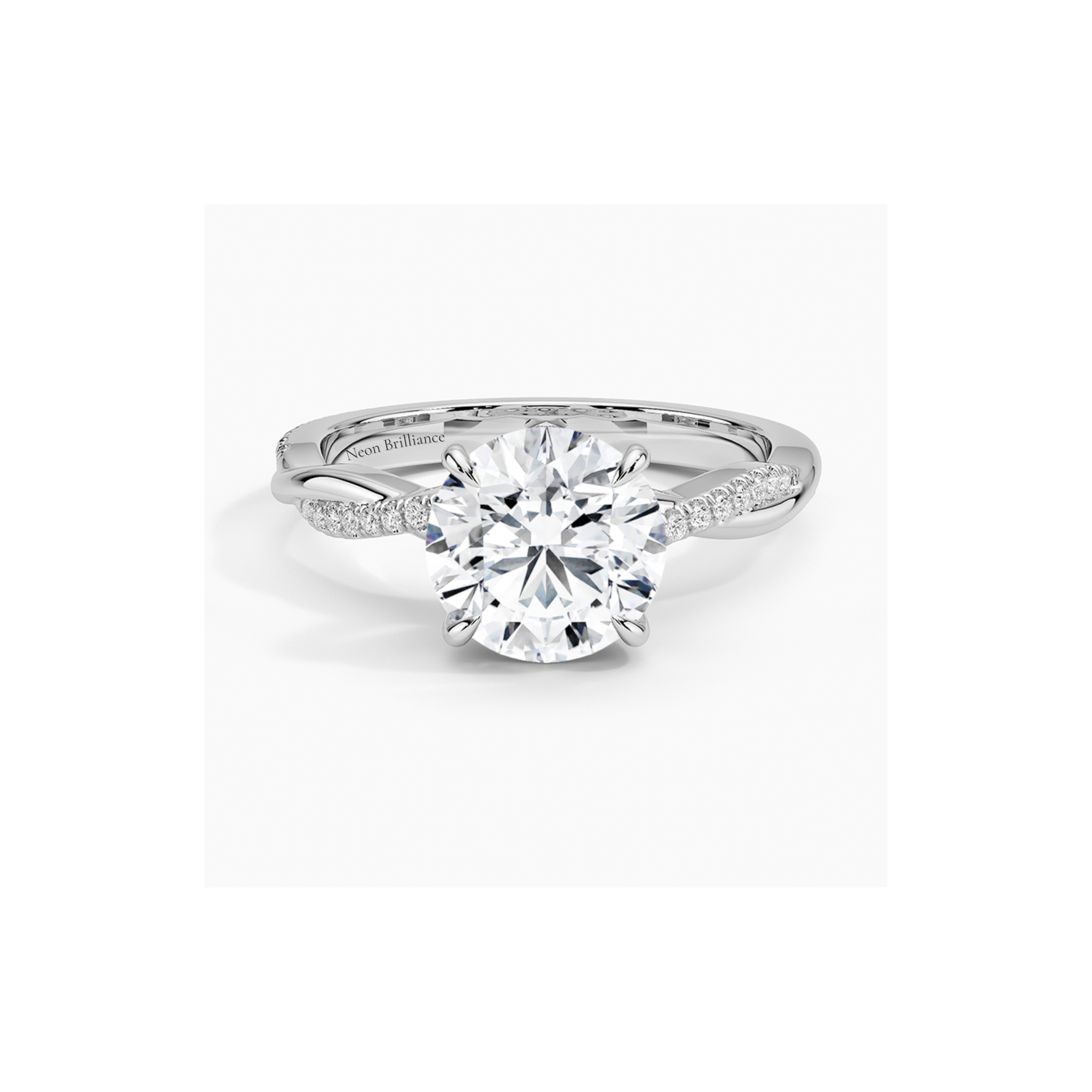 14K white gold engagement ring with infinity twist pavé band and round-cut lab-grown diamond. Elegant and timeless bridal jewelry.
