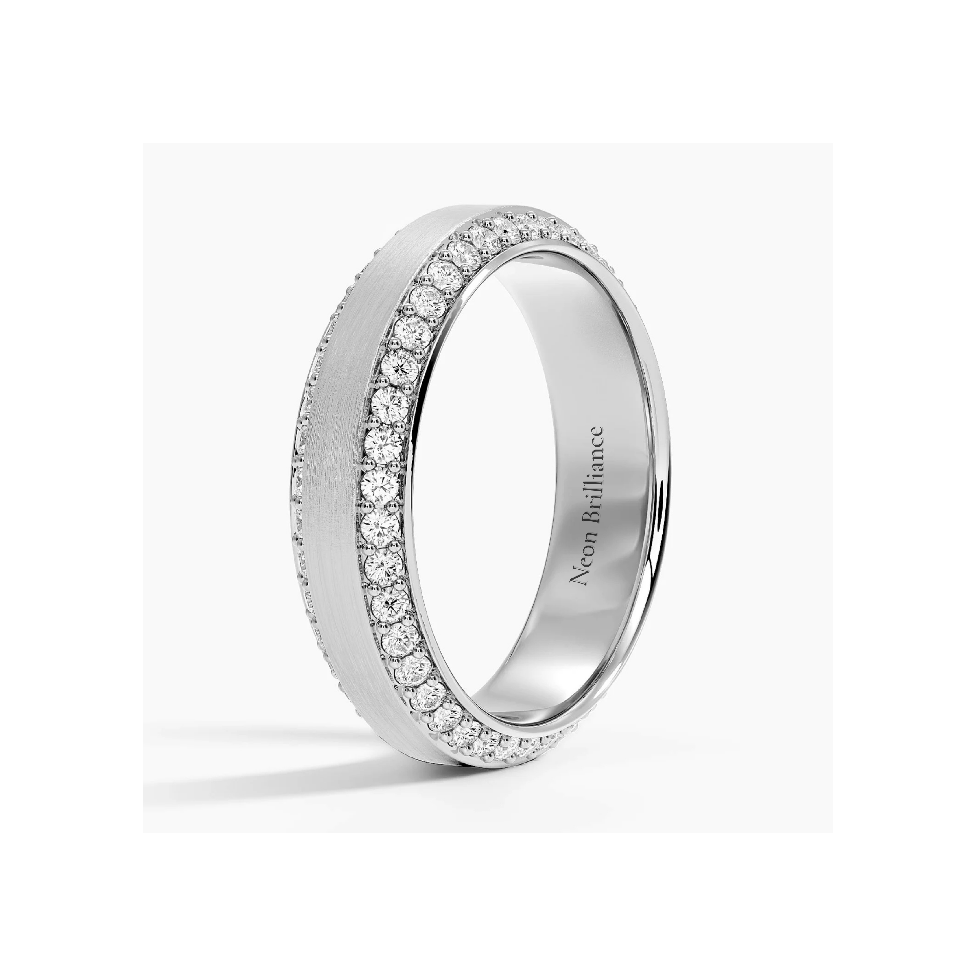 Elegant 14K gold eternity band with pavé-set diamonds and a brushed gold center. A sophisticated men’s or women’s wedding band with heirloom-quality craftsmanship.

