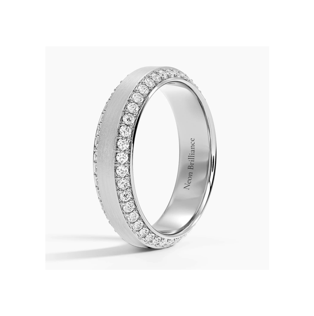 Elegant 14K gold eternity band with pavé-set diamonds and a brushed gold center. A sophisticated men’s or women’s wedding band with heirloom-quality craftsmanship.

