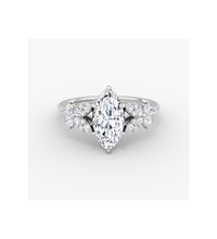 Elegant 14K gold diamond ring with a stunning marquise-cut center stone, surrounded by pavé-set accent diamonds in a timeless and luxurious design.