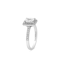 14K white gold emerald-cut diamond halo ring with pavé accents, featuring a luxurious handcrafted design, perfect for bridal and fine jewelry collections.
