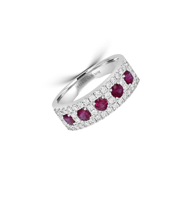Five oval rubies alternating with round diamonds in a 14K white gold band ring.