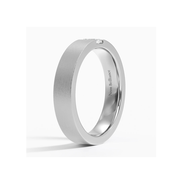Men’s 14K gold wedding band with an emerald-cut diamond in a bezel setting. Sleek, modern, and sophisticated for a timeless luxury look.