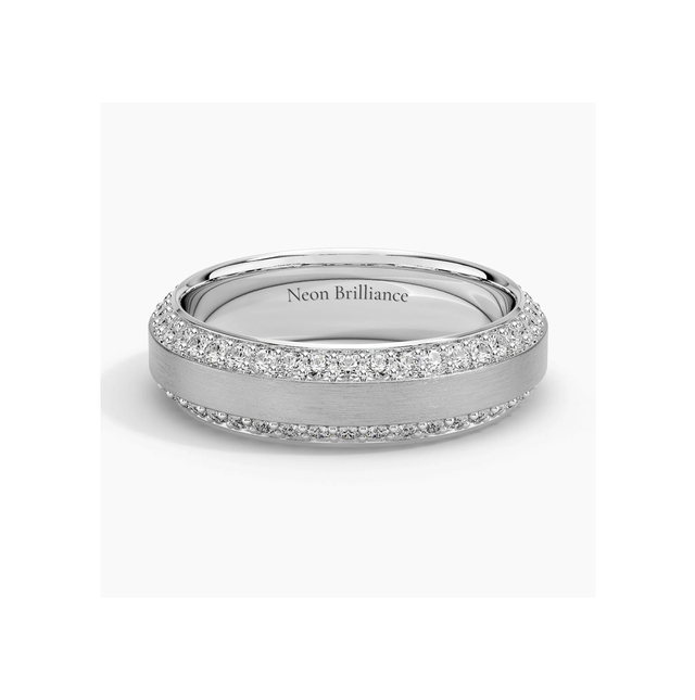 Elegant 14K gold eternity band with pavé-set diamonds and a brushed gold center. A sophisticated men’s or women’s wedding band with heirloom-quality craftsmanship.

