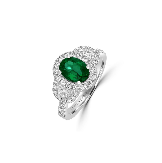 Luxury oval emerald and diamond halo ring set in 14K white gold, featuring brilliant-cut diamonds on a polished band.

