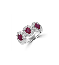 Three oval ruby and diamond halo ring in 14K white gold with split shank design
