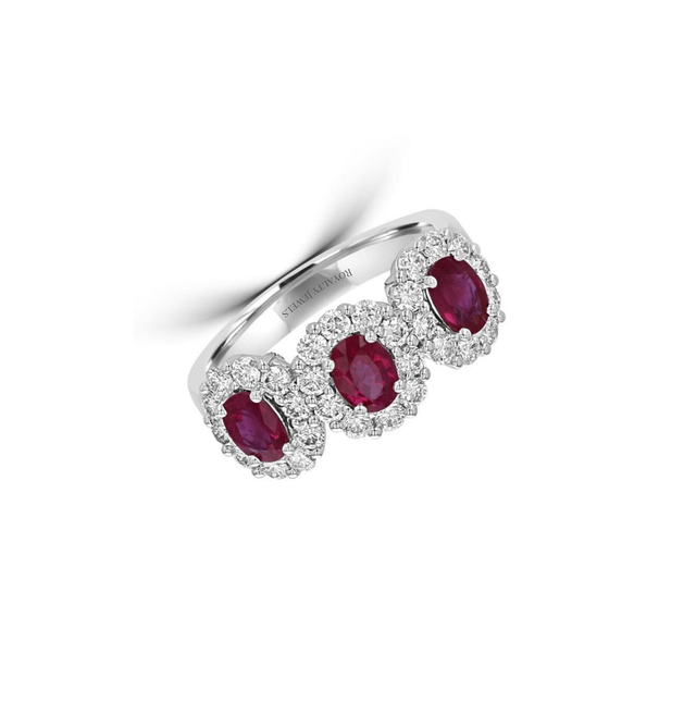 Three oval ruby and diamond halo ring in 14K white gold with split shank design
