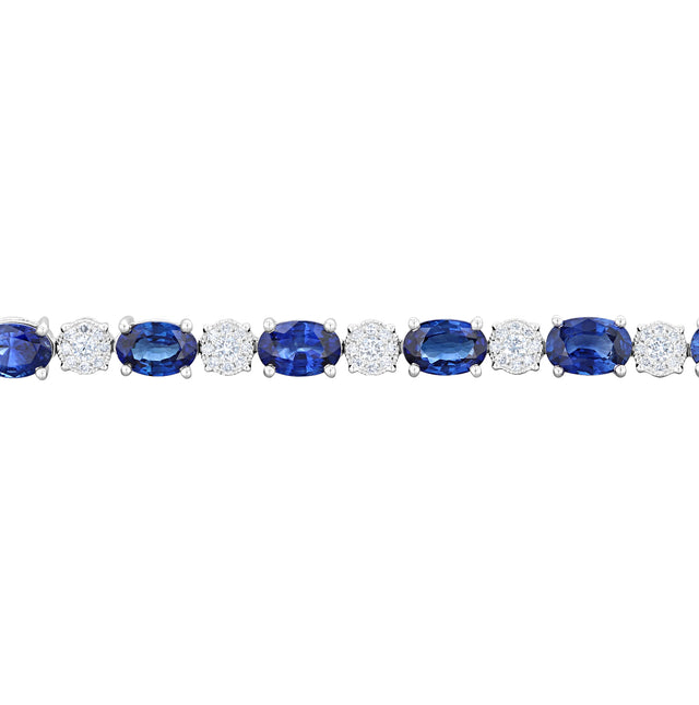 14K white gold tennis bracelet with 4x6 oval sapphires and round diamonds in prong setting