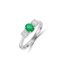 Luxury 14K white gold ring with oval emerald and two round diamonds
