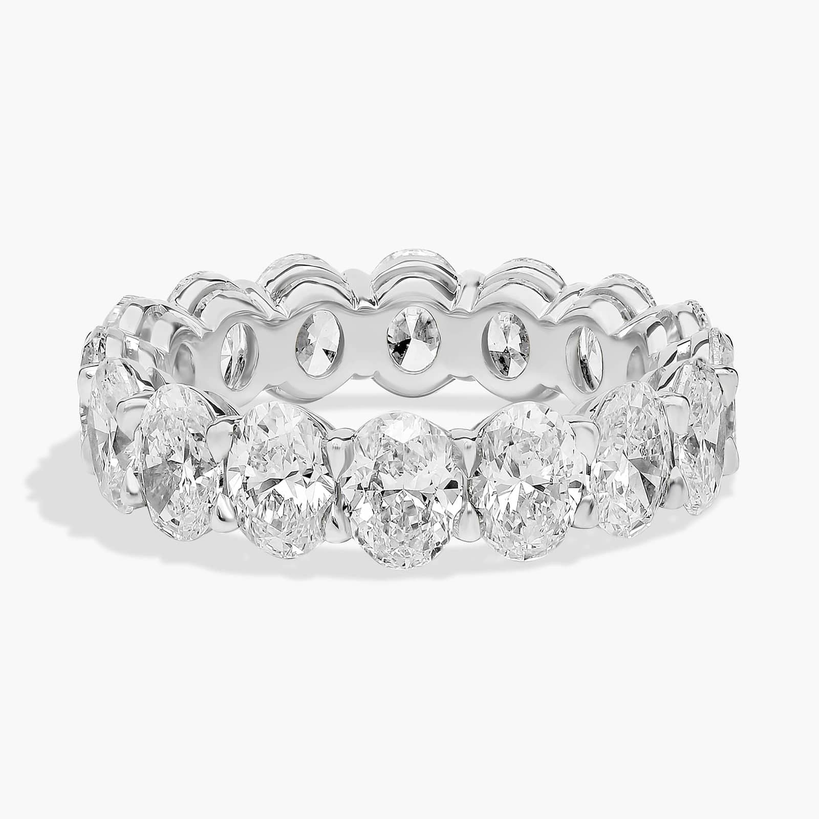 14K white gold oval lab diamond eternity ring on model’s hand