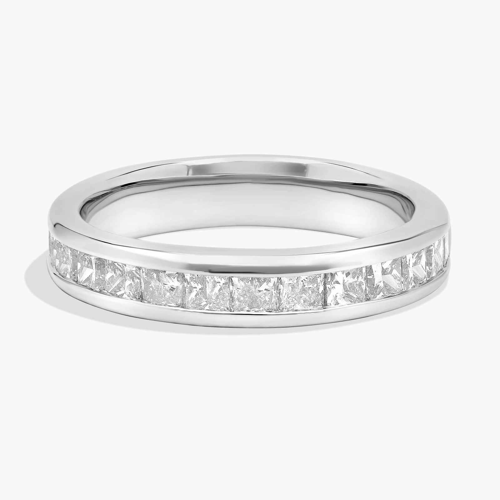 14K white gold channel-set band with princess-cut lab-grown diamonds, displayed on hand and white background.