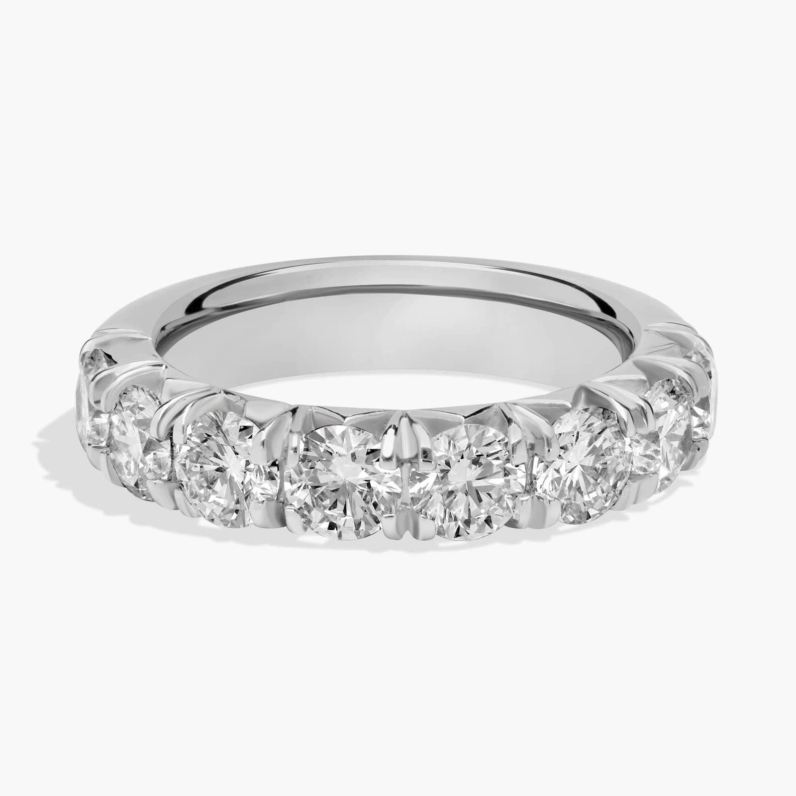 14K white gold round lab-grown diamond anniversary band ring displayed on hand and in studio setting

