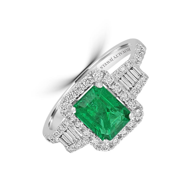 14K gold emerald cut emerald ring with round and baguette diamond halo setting