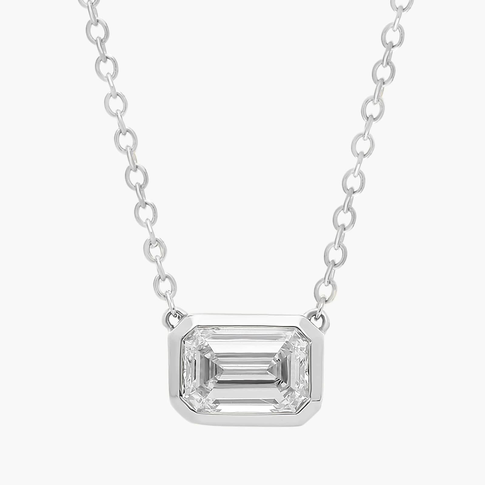 14K gold necklace featuring an emerald-cut lab-grown diamond pendant on a delicate chain