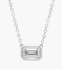 14K gold necklace featuring an emerald-cut lab-grown diamond pendant on a delicate chain