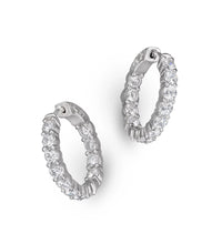 Luxury 14K gold diamond hoop earrings featuring lab-grown diamonds in a pavé setting. Available in Yellow Gold, White Gold, and Rose Gold.
