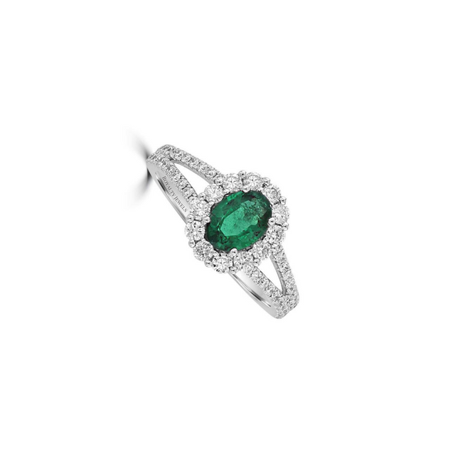 oval emerald and diamond halo ring in 14K white gold with split shank design