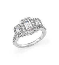14K white gold diamond halo ring with emerald-cut lab-grown diamonds, featuring a triple halo pavé setting, perfect for bridal and fine jewelry collections.

