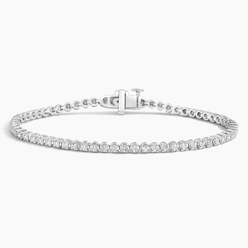 14K gold diamond tennis bracelet with lab-grown diamonds in a classic, elegant design. Available in White, Yellow, and Rose Gold.

