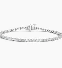 14K gold diamond tennis bracelet with lab-grown diamonds in a classic, elegant design. Available in White, Yellow, and Rose Gold.

