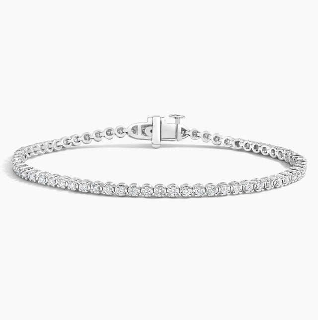 14K gold diamond tennis bracelet with lab-grown diamonds in a classic, elegant design. Available in White, Yellow, and Rose Gold.

