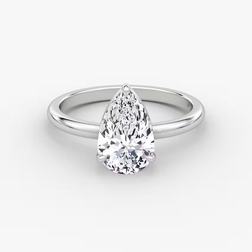 14K gold band with pear-cut lab-grown diamond in elegant solitaire setting

